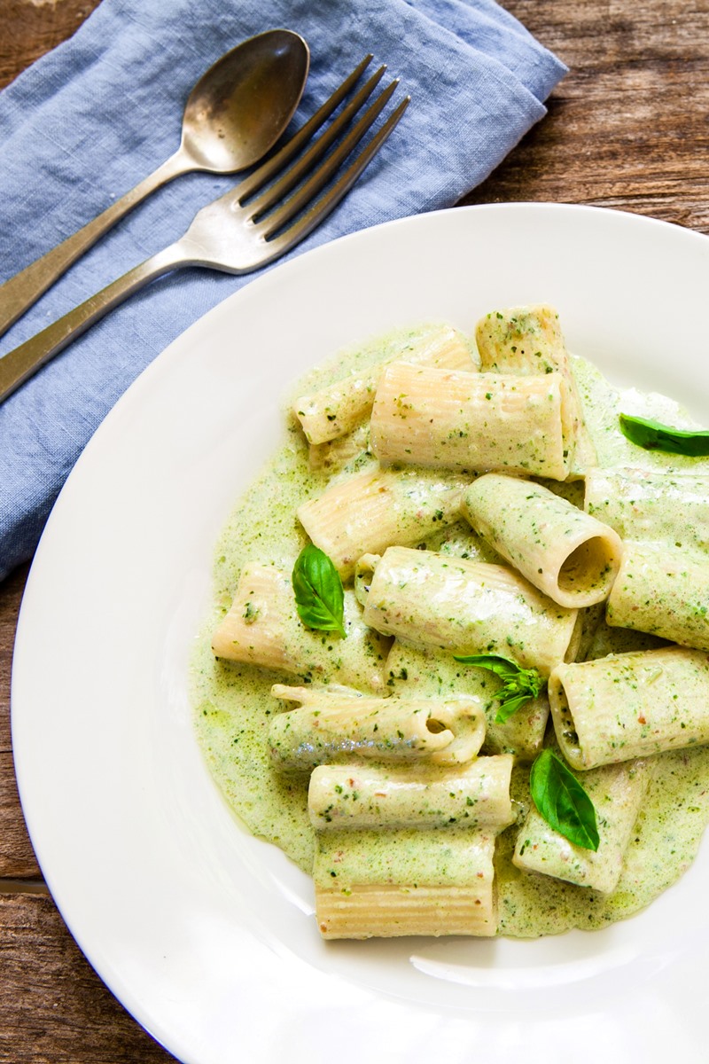 Dairy-free Pesto Cream Pasta Recipe - soy-free and plant-based with gluten-free and vegan options. 30 minute weeknight meal! Full of flavor, but cheese-less.